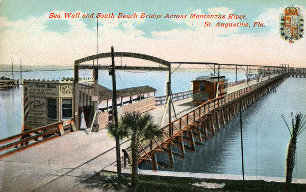 Old St. Augustine postcard showing the old wooden bridge that extended from the foot of King Street over to Anastasia Island before the Bridge of Lions was built.