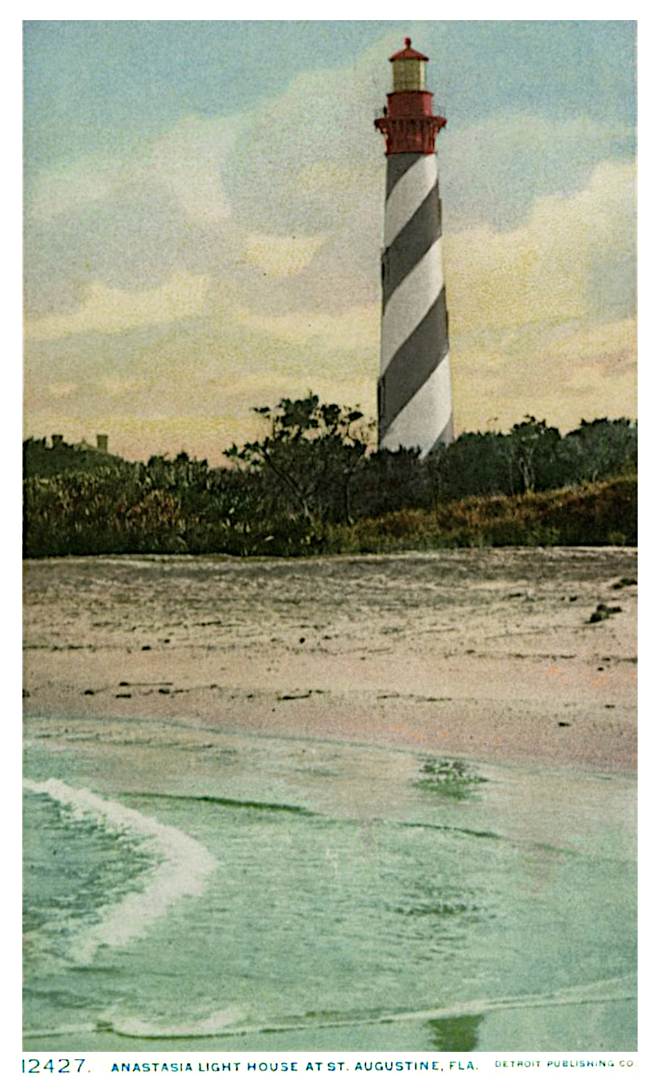 Vertical old postcard of the St. Augustine/Anastasia lighthouse, with water in front.